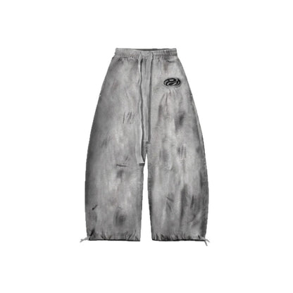 Mottled distressed casual all-match sweatpants in a relaxed fit, shown in neutral tones