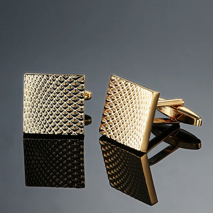 Copper black and golden silver laser metal cufflinks close-up