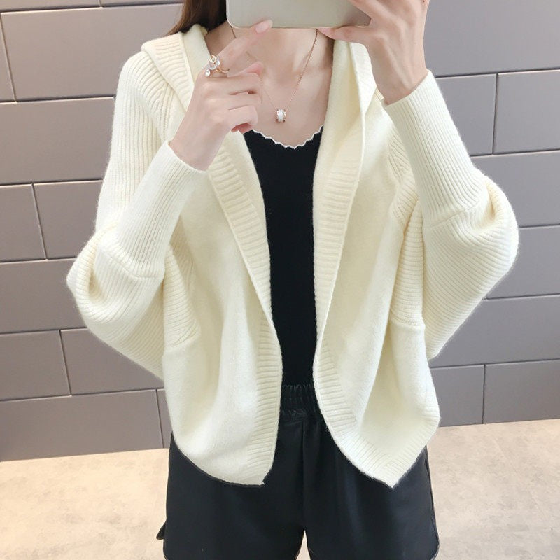 Solid-color knitted cardigan jacket for women in a classic design