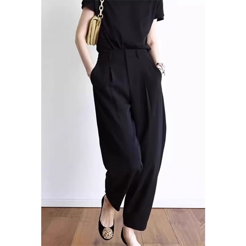 Women's casual cropped harem pants with relaxed fit and tapered legs in a versatile solid color