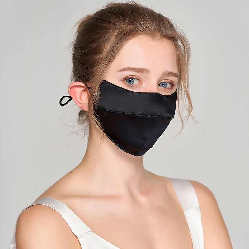 Sun protective summer face mask providing full-face UV protection, shown in black fabric with ear loops