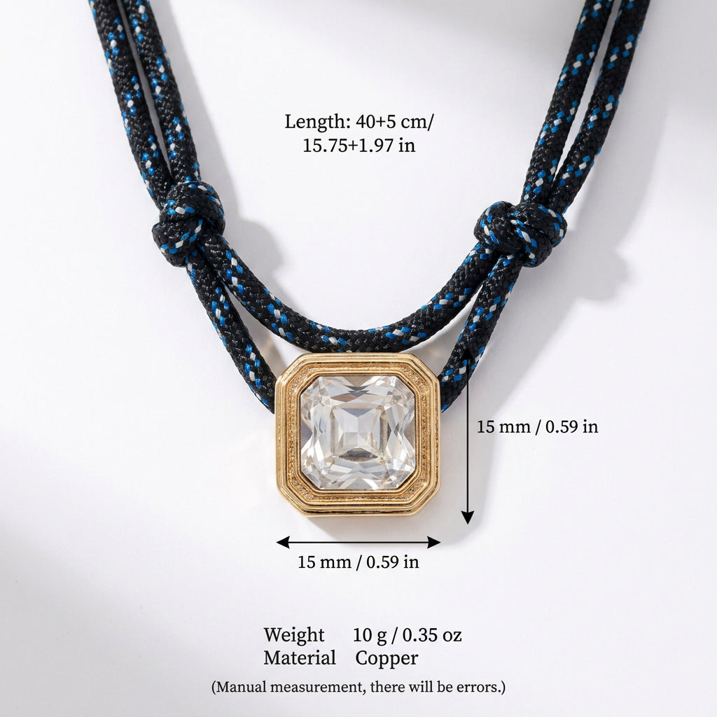 Double-rope knotted layered necklace with a band in a textured metallic design