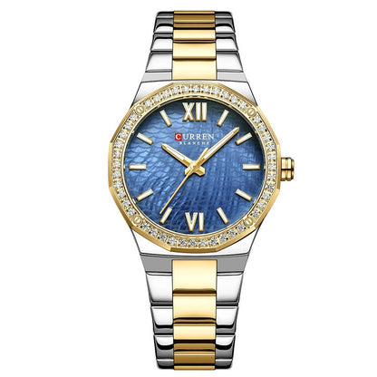 Women's small dial casual watch with Roman numeral markers and a classic wristwatch design