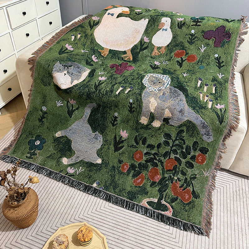 Ancient-style artistic tapestry knitted throw blanket draped over a sofa