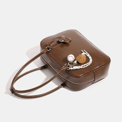 Women's large-capacity commuter tote shoulder bag in a structured design with comfortable shoulder straps