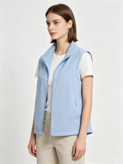 Men's and women's softshell vest with stand collar, zip front, fleece lining, and sleeveless outdoor design