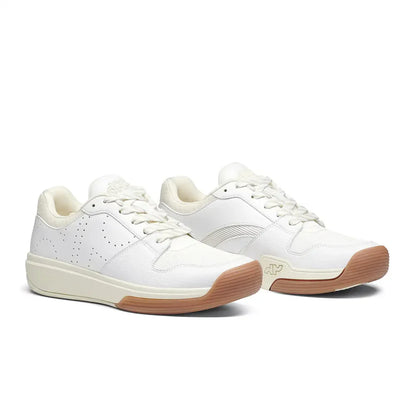 Women's DAPS DESI Low Pickleball Shoes by DAPSFIT in white and cream, featuring a low-profile design and athletic sole.