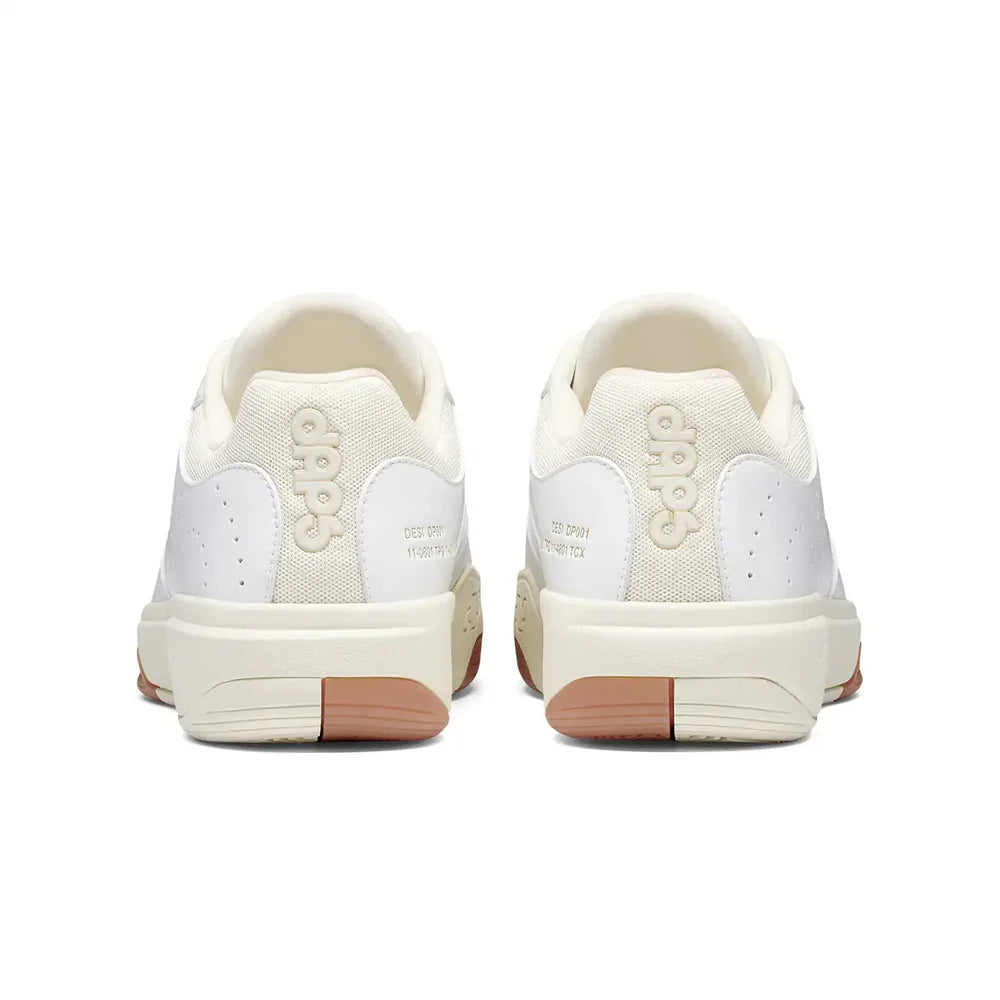 Women's DAPS DESI Low Pickleball Shoes by DAPSFIT in white and cream, featuring a sleek design and supportive sole.