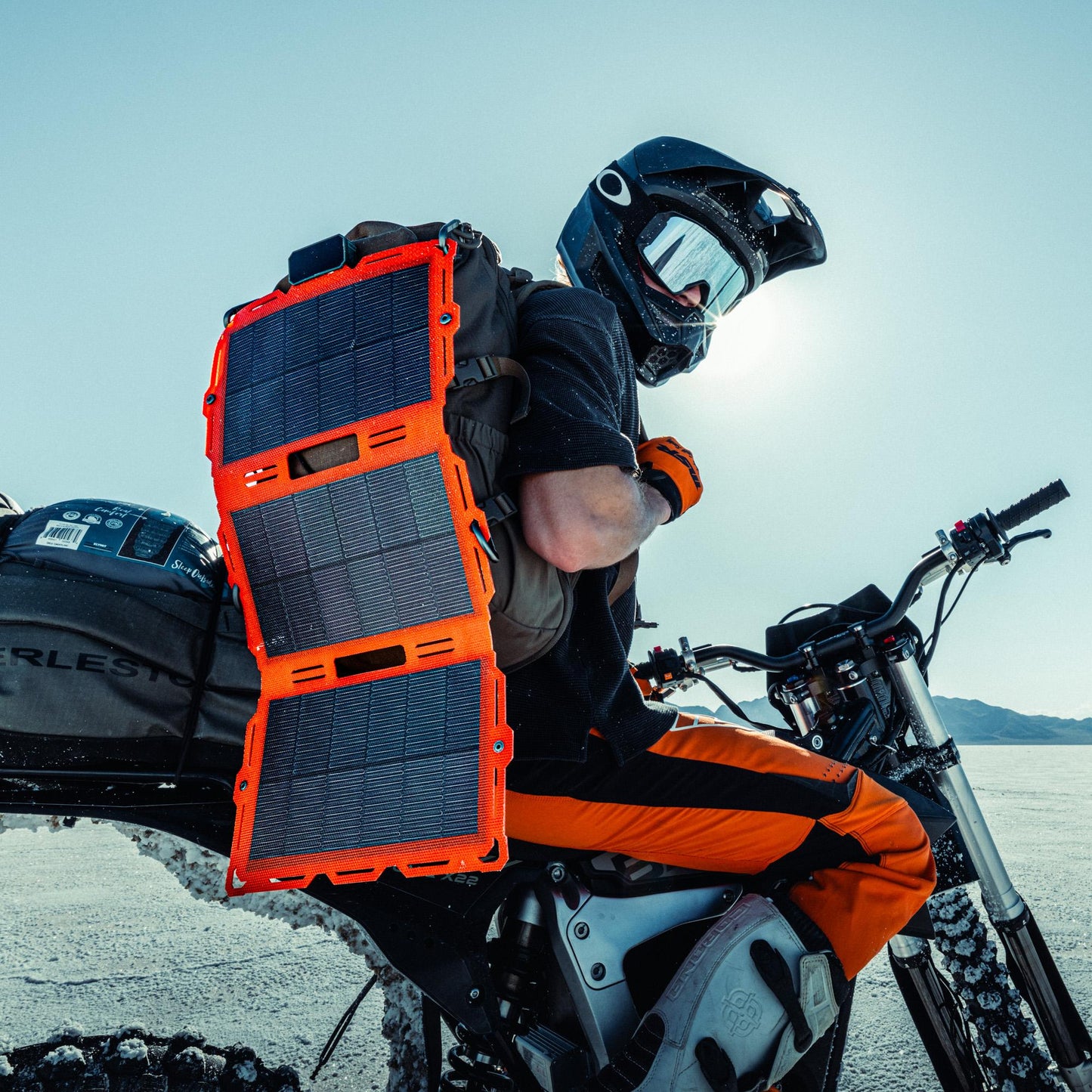 Dark Energy Spectre 18W solar panel with square design and multiple photovoltaic cells, ideal for portable solar power applications.