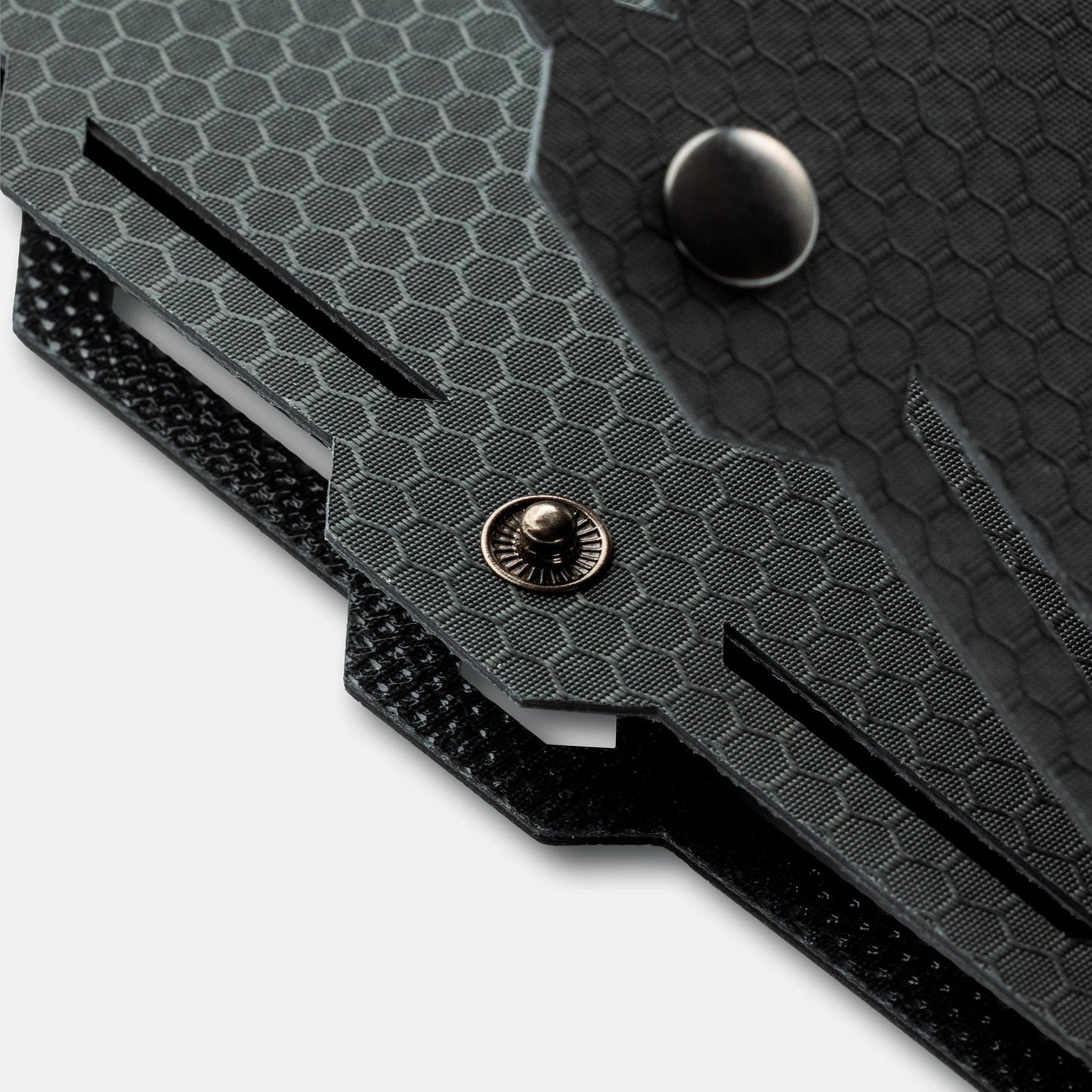 Close-up of grey buttons on the Dark Energy Spectre 18W Solar Panel showing control interfaces and connectors.