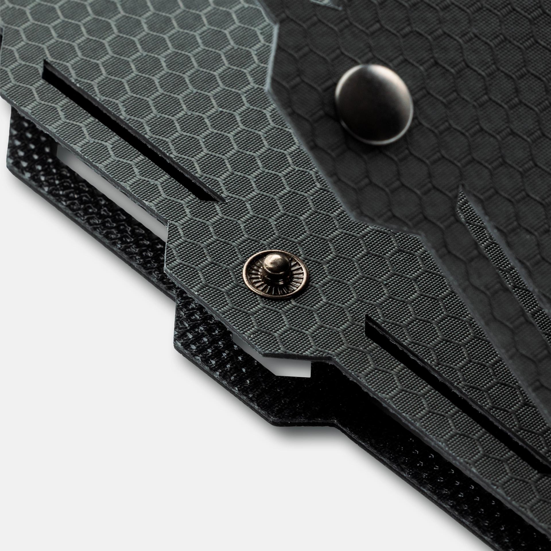 Close-up of grey buttons on the Dark Energy Spectre 18W Solar Panel showing control interfaces and connectors.