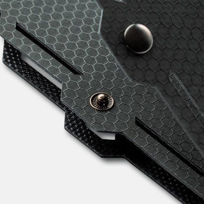 Close-up of grey buttons on the Dark Energy Spectre 18W Solar Panel showing control interfaces and connectors.