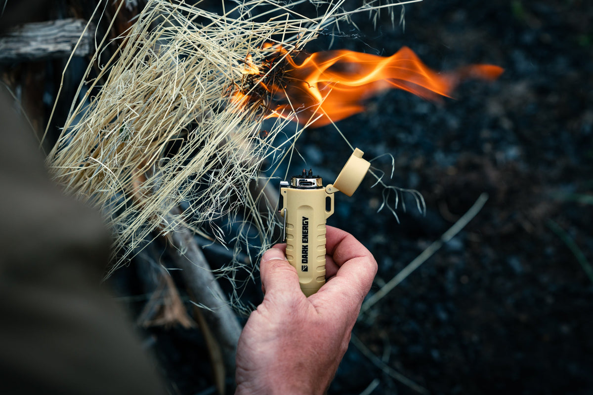 Dark Energy plasma lighter with sleek black design and illuminated ignition button, showcasing modern electronic lighter features.