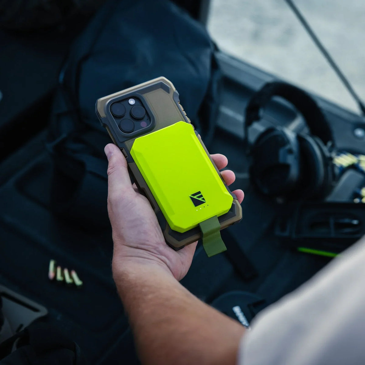 Dark Energy Poseidon Nano Power Bank, a sleek portable charger with a compact square design for on-the-go device charging.