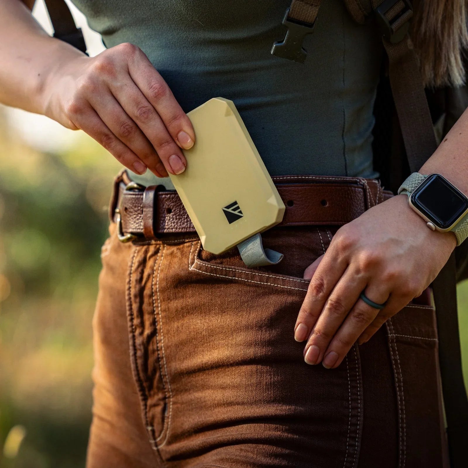 Dark Energy Poseidon Nano Power Bank portable charger with compact design and multiple charging ports on a white background.