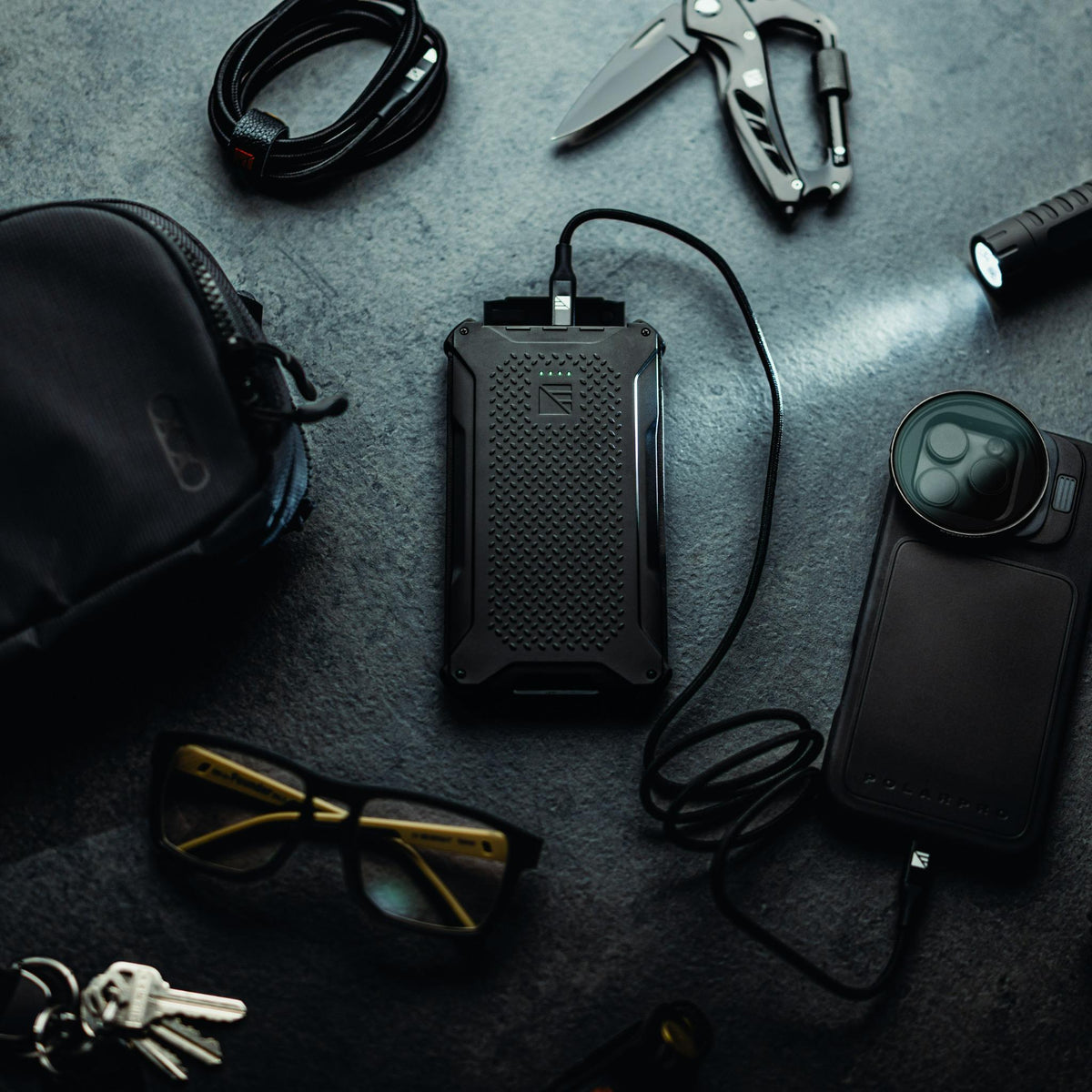 Dark Energy Poseidon Pro Power Bank, portable charger with multiple USB ports and sleek design, ready for on-the-go charging.