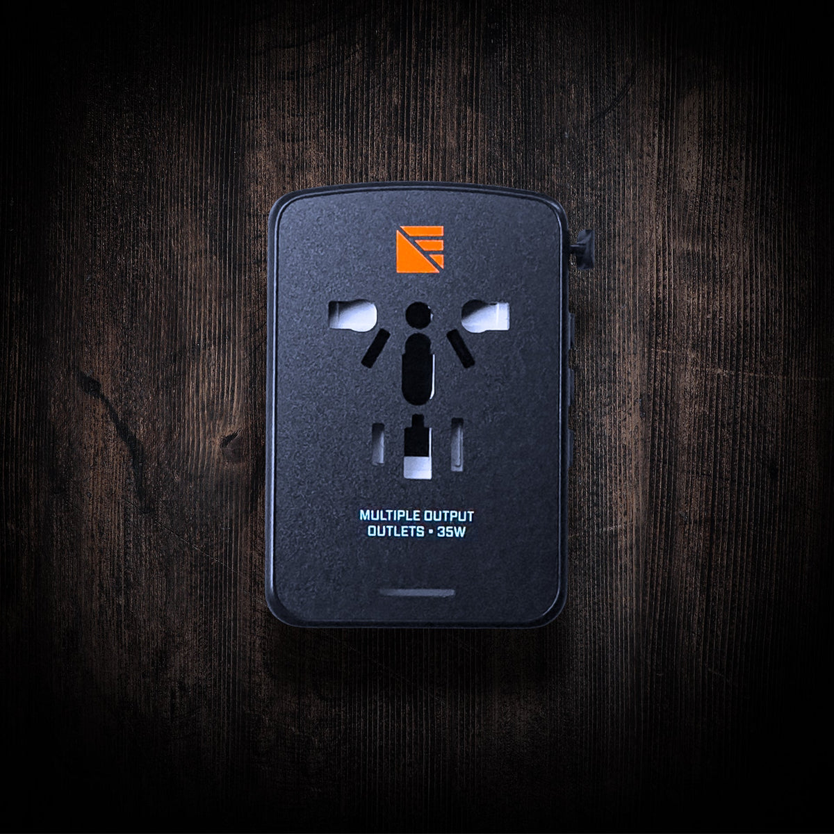Dark Energy international wall adapter with multiple plug options for global electrical compatibility.