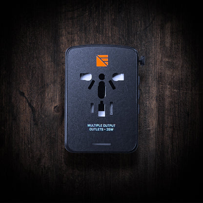 Dark Energy international wall adapter with multiple plug options for global electrical compatibility.