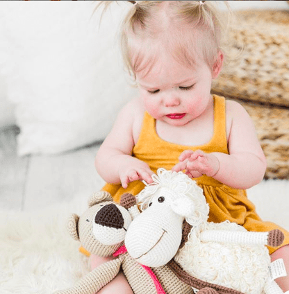 Darla the Sheep stuffed animal in white, handmade from organic cotton by Bebemoss, soft and cuddly for children.