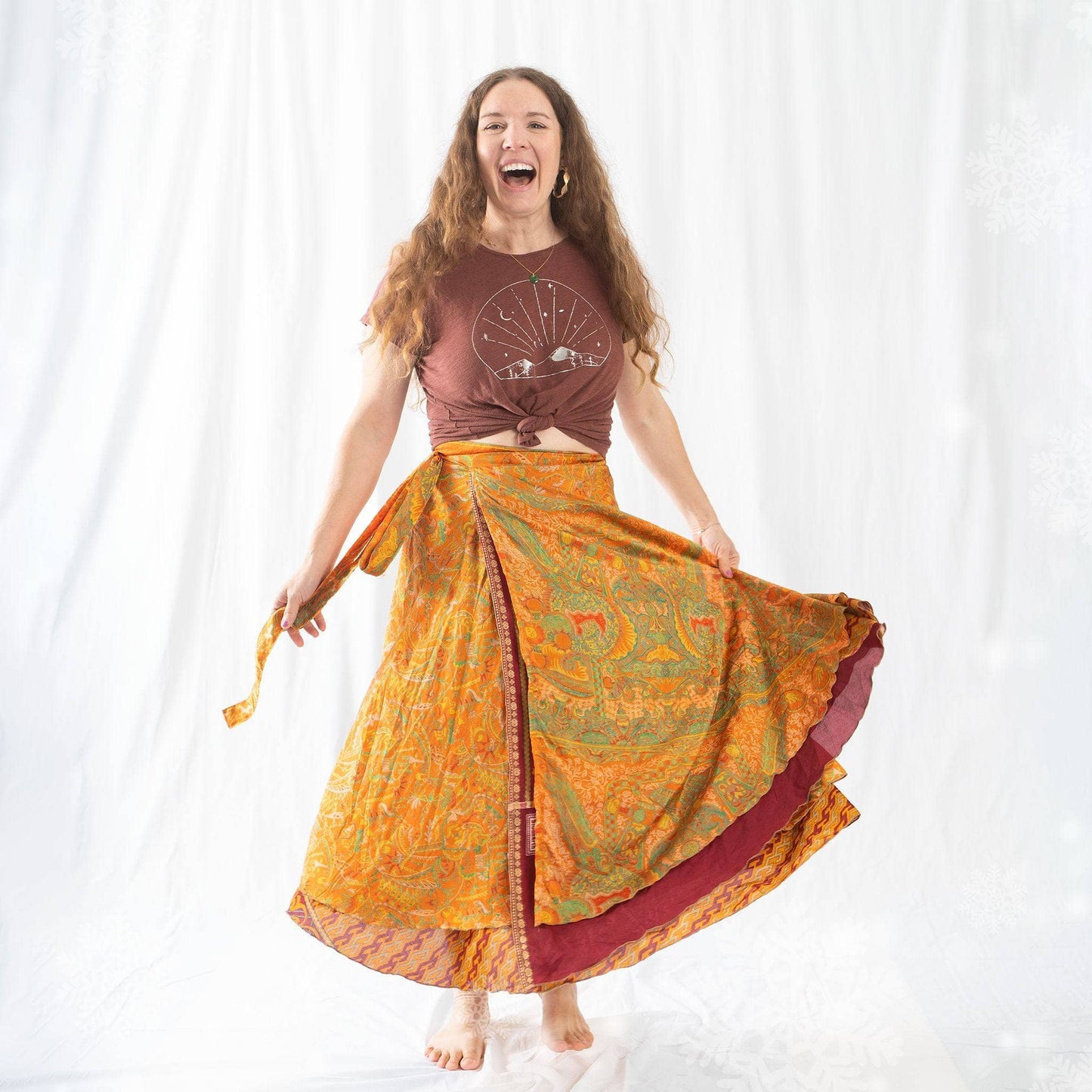 Colorful sari wrap skirt by Darn Good Yarn, featuring vibrant cool tones and flowing fabric, perfect for boho-inspired outfits.