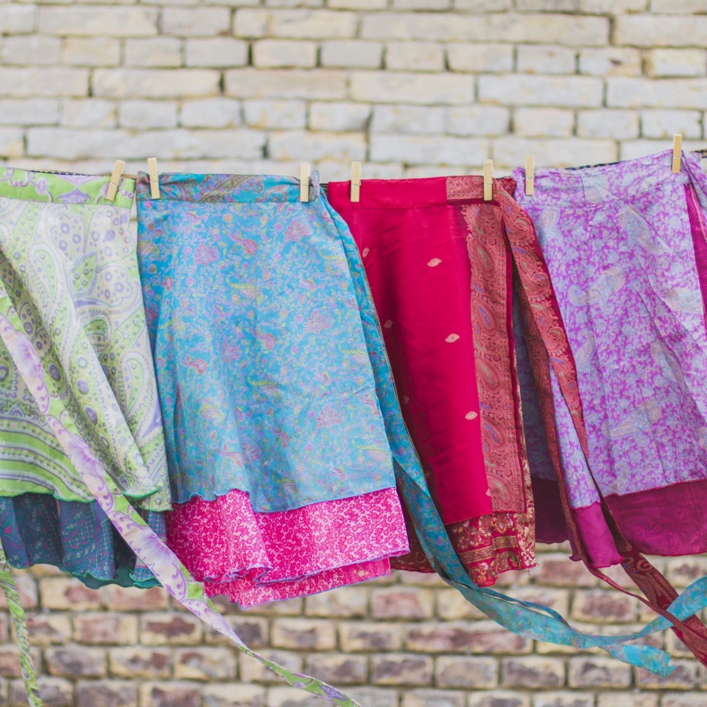 Darn Good Yarn Original Sari Wrap Skirt in cool tones, flowing clothing accessory with vibrant sari fabric design.