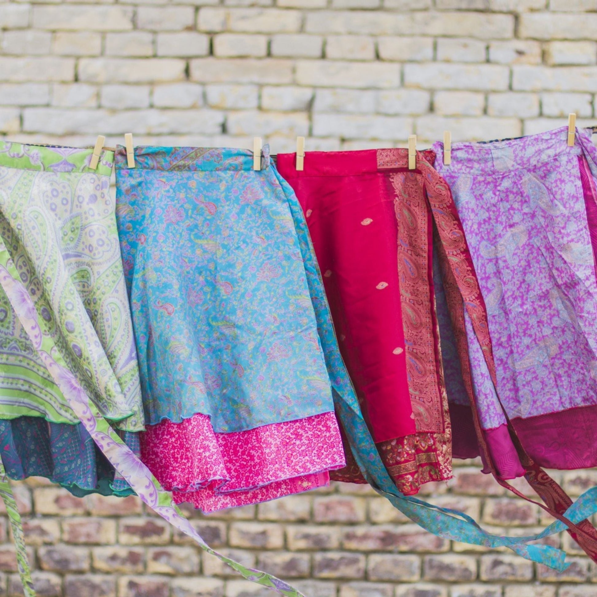 Darn Good Yarn Original Sari Wrap Skirt in cool tones, flowing clothing accessory with vibrant sari fabric design.