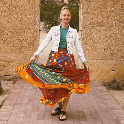 Darn Good Yarn The Original Sari Wrap Skirt in cool tones, showcasing vibrant, colorful fabric with a flowing maxi style.