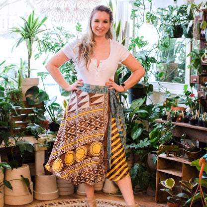 Darn Good Yarn The Original Sari Wrap Skirt in cool tones, flowing fabric, styled as a versatile clothing accessory.