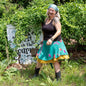 Darn Good Yarn The Original Sari Wrap Skirt in cool-tones, vibrant fabric with draped, wrap-around design, styled for casual wear.