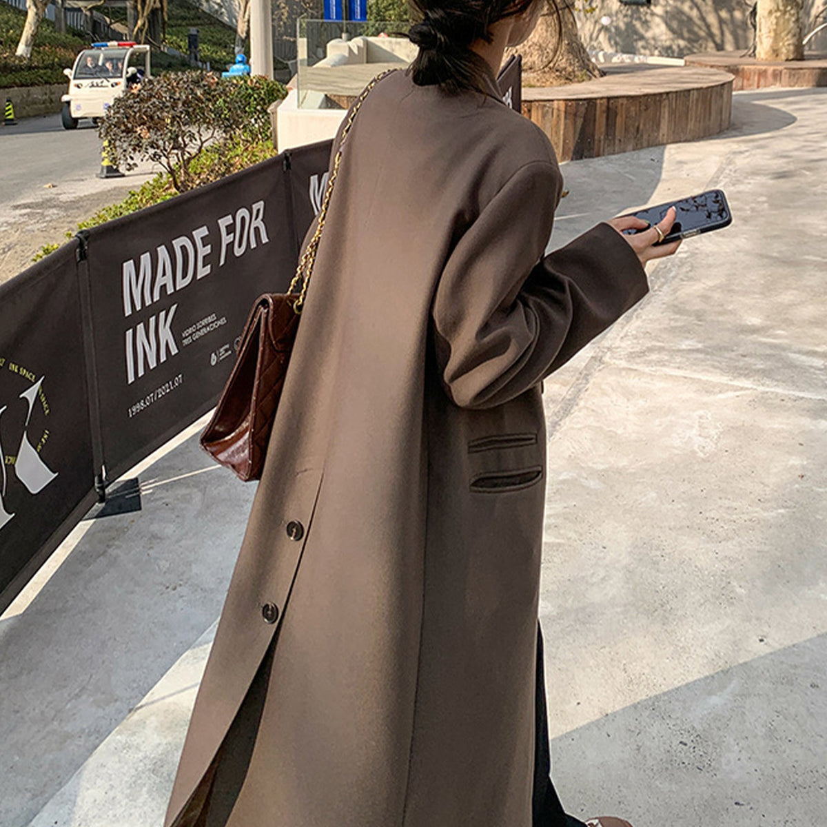 Women's long British-style trench coat in classic design for spring outerwear