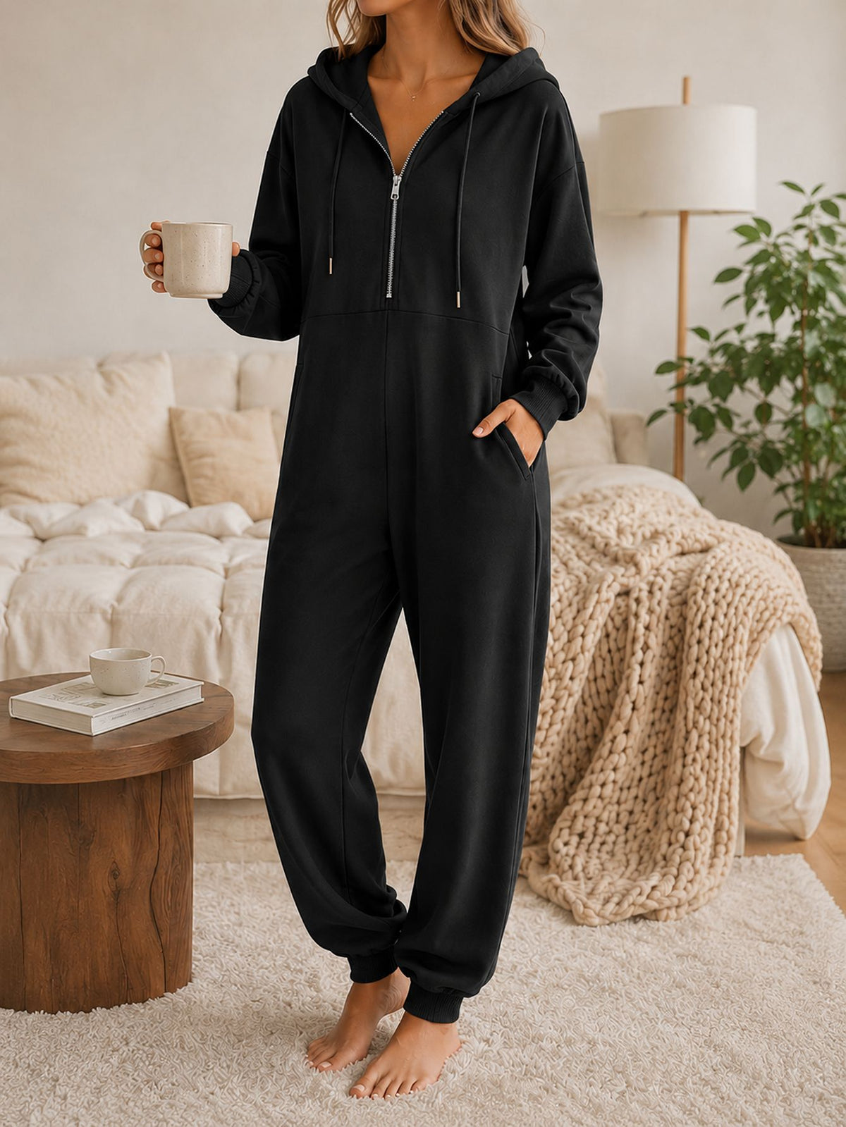 Hooded zip-up casual loose-fitting jumpsuit in a relaxed silhouette, shown in full view