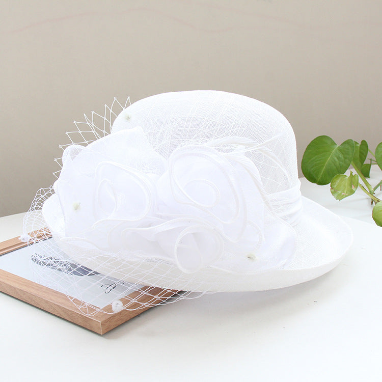 Banquet flower top hat with curled brim, decorative floral detail, and structured sun hat design