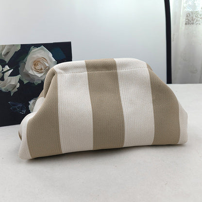 Women's knitted striped clutch bag by My Store, shown in a compact woven design