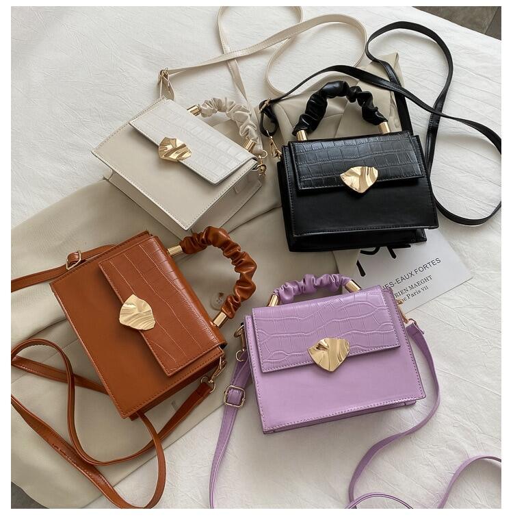 BACKUPMYFILESNOW® women's designer crossbody handbag with stone pattern, featuring a stylish and compact design.