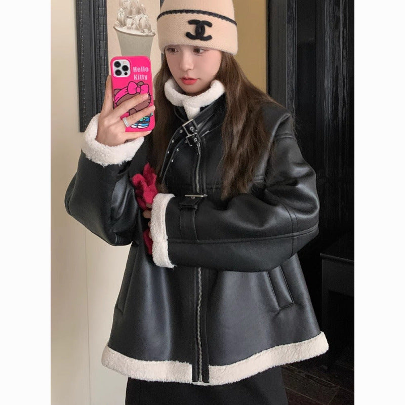 Black lambswool motorcycle coat, loose winter fit with long sleeves and front closure