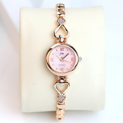 Women's steel strap student watch bracelet with a sleek metal band and classic watch face