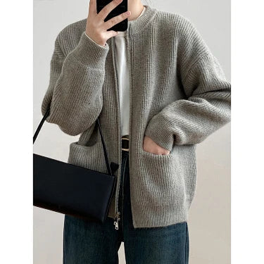 Women's laid-back style zip-up sweater coat with a cozy knit texture and full-length front zipper