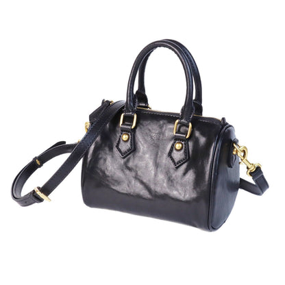 Boston-style sophisticated vintage handbag with a niche design, shown in a classic structured silhouette
