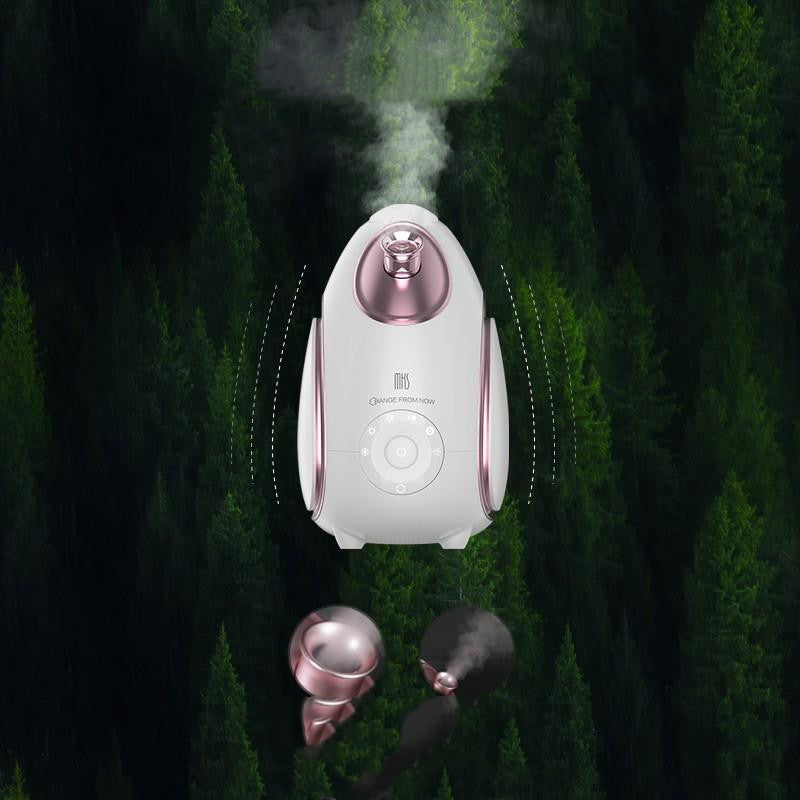 Household face aromatherapy steamer with cold and hot mist settings, white countertop design