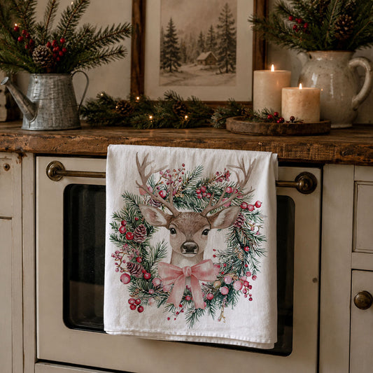 Gia Roma deer wreath dish towel featuring a festive deer design on soft fabric for kitchen decor.