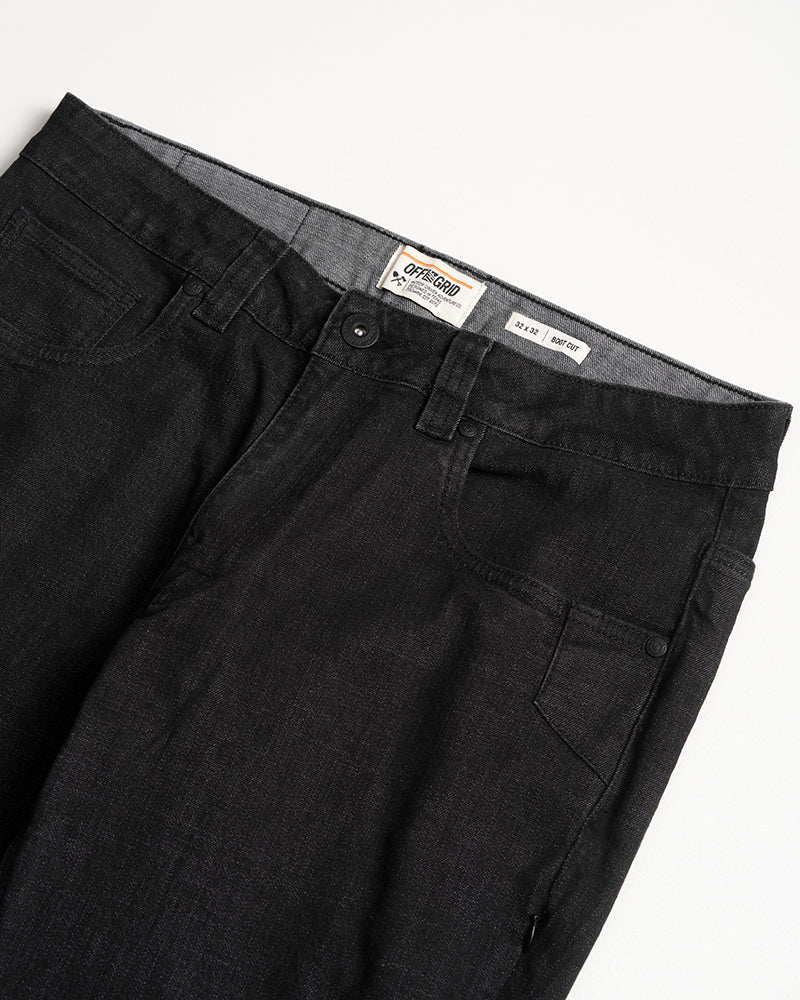 Black Hideout Denim Boot Cut Pants by Off The Grid Surplus, showing the relaxed fit and classic denim texture.