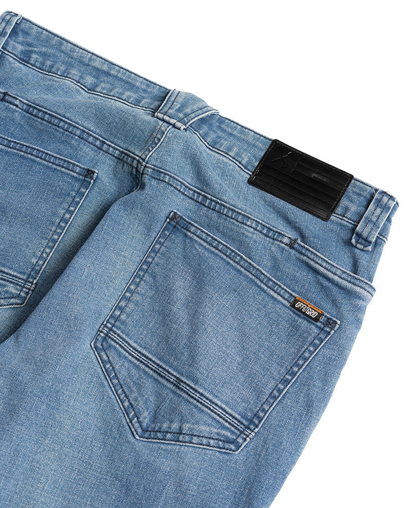 Off The Grid Surplus Hideout Denim Boot Cut pants in vintage wash with classic fit and denim texture.