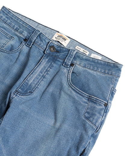 Off The Grid Surplus Hideout Denim Boot Cut pants in vintage wash, showcasing classic denim style with a relaxed fit.