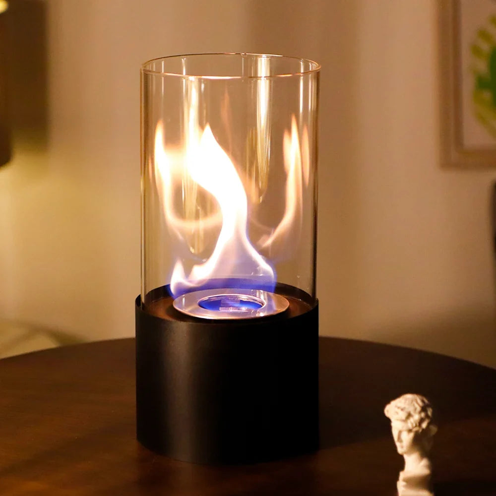 JHY DESIGN portable tabletop firepit with cylindrical glass enclosure, suitable for gel and ethanol fireplaces on a desktop.