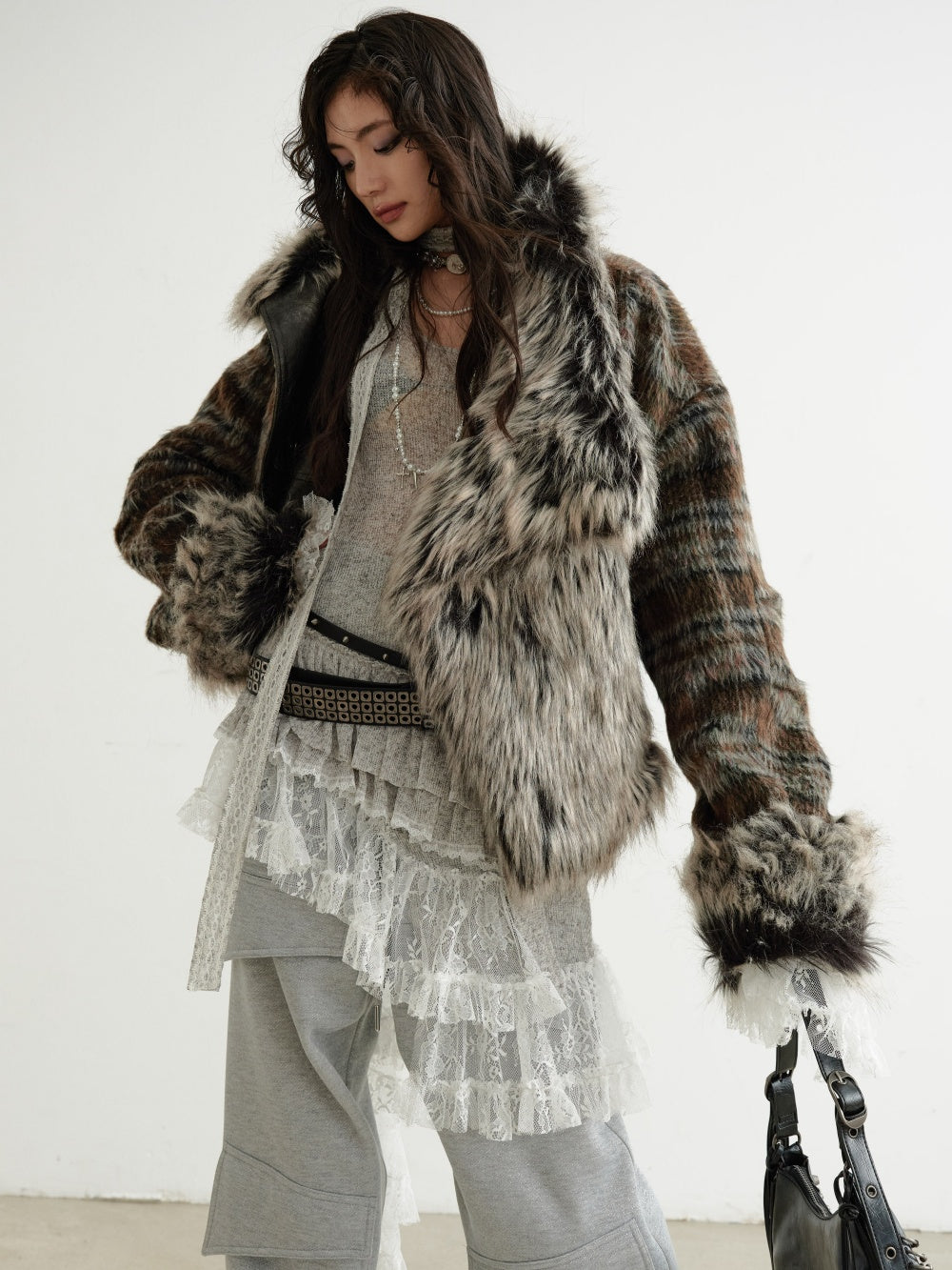 Women's reversible plaid PU leather jacket, showing plaid pattern and leather side