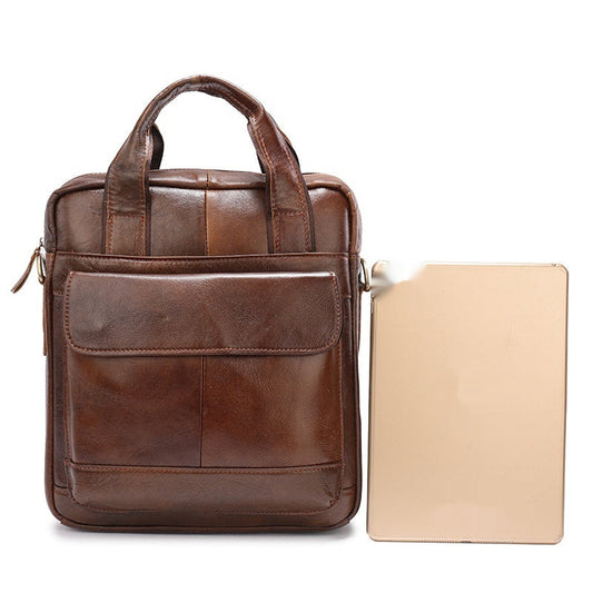 Vertical retro men's briefcase handbag in a structured design with a top handle and shoulder strap
