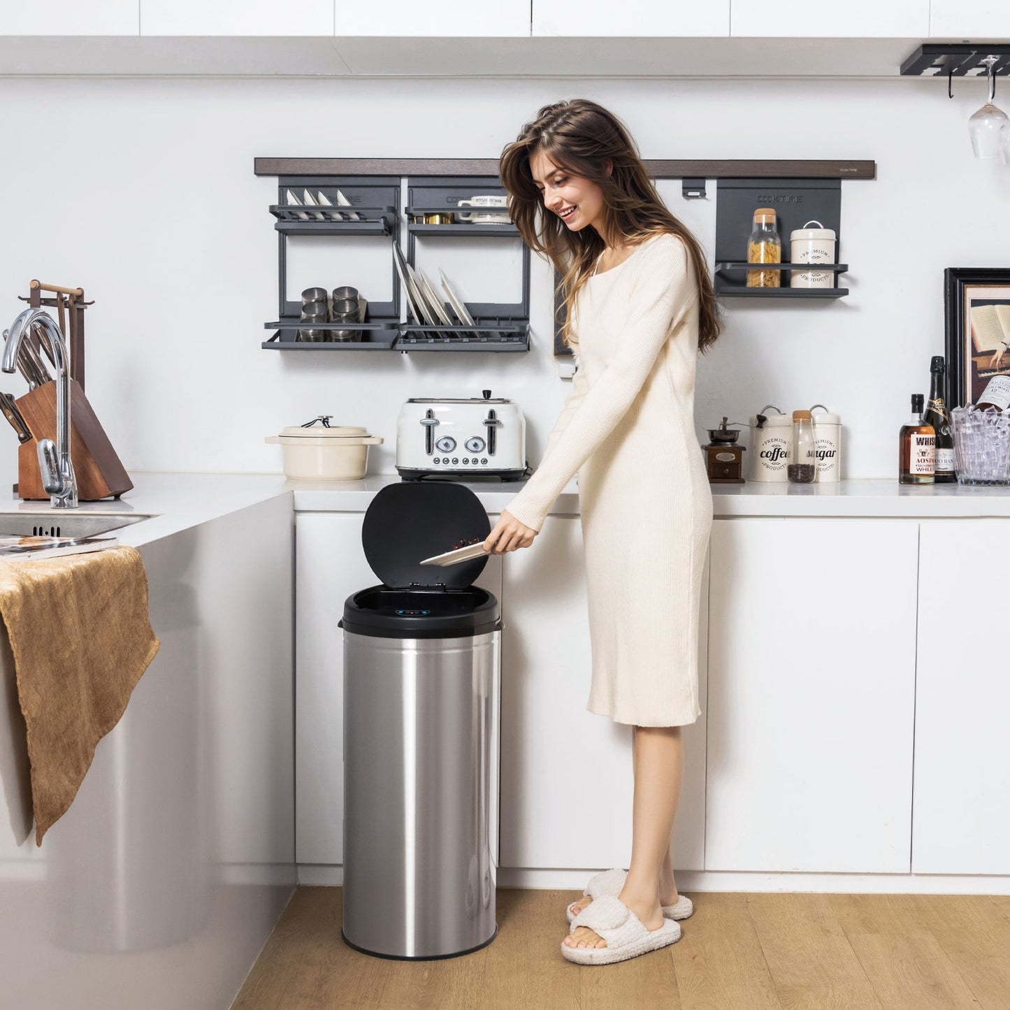 Silver 8-gallon automatic trash can with stainless steel frame and touchless operation, ideal for modern kitchen or office use.