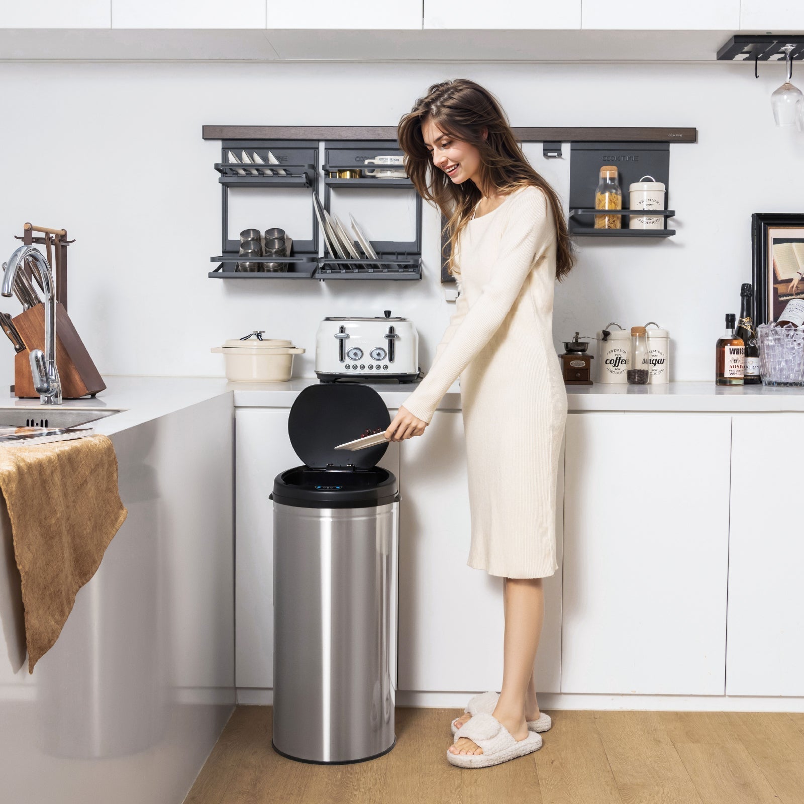 Silver 8-gallon automatic trash can with stainless steel frame and touchless operation, ideal for modern kitchen or office use.