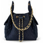Medium Bayshore Bucket Bag by BEACH HAUS in dark wash denim, featuring a casual, stylish design with sturdy straps and spacious interior.