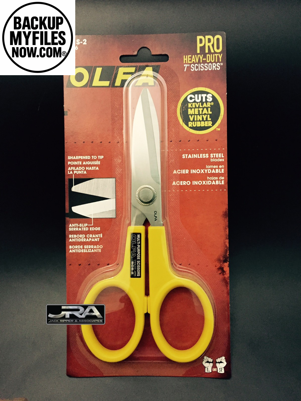 OLFA 7-inch stainless steel serrated scissors with sharp blades, ideal for cutting fabric, paper, and craft materials.